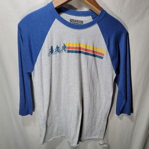 Women’s Stranger Things size medium college style kids on bikes in great shape.